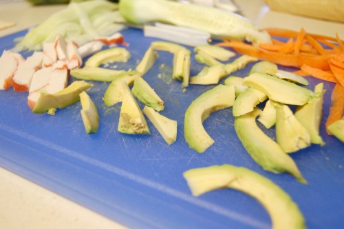 vegetables sliced up on cutting board