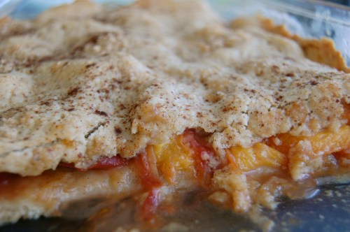 Pan of peach cobbler from the side